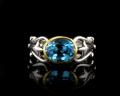 8032R-BT	18K Gold & sterling silver blue topaz ring 

