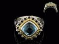 8007R-BT 18K Gold & sterling silver blue topaz ring 
