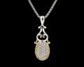 8023P	18K Gold & sterling silver pendant with diamonds 


