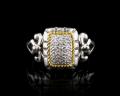 8024R	18K Gold & sterling silver ring with diamonds 



